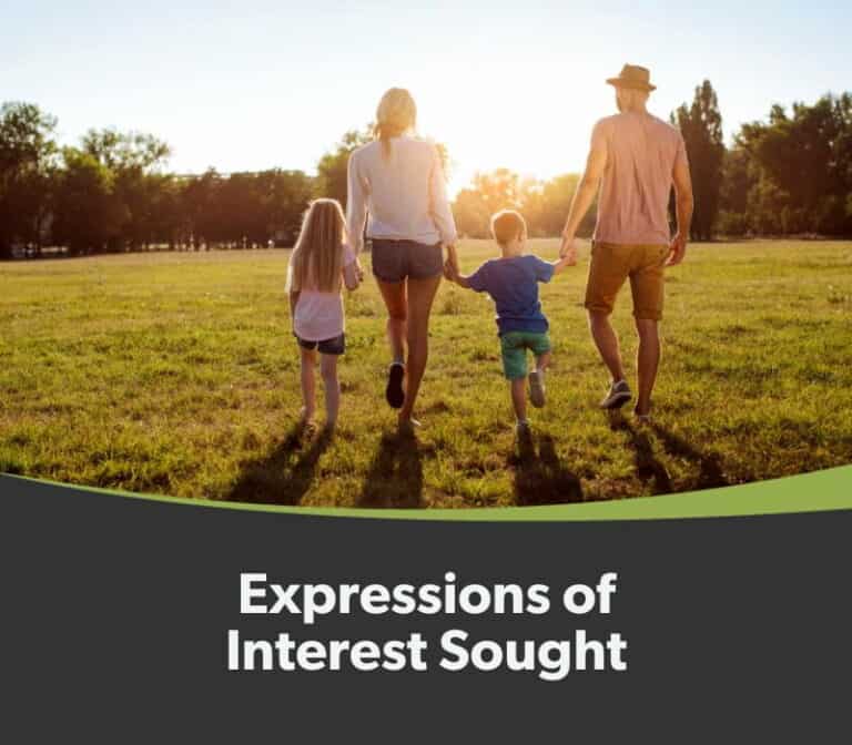 Family of four holding hands and walking through a sunlit park with the text 'Expressions of Interest Sought' below