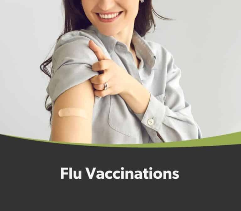Smiling woman showing her arm with a bandage after receiving a flu vaccination, with text below reading "flu vaccinations".